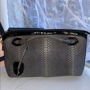 Gray and black snake print purse